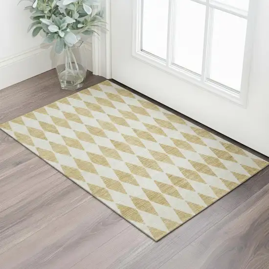 Gold And Ivory Diamond Washable Area Rug With UV Protection Photo 1