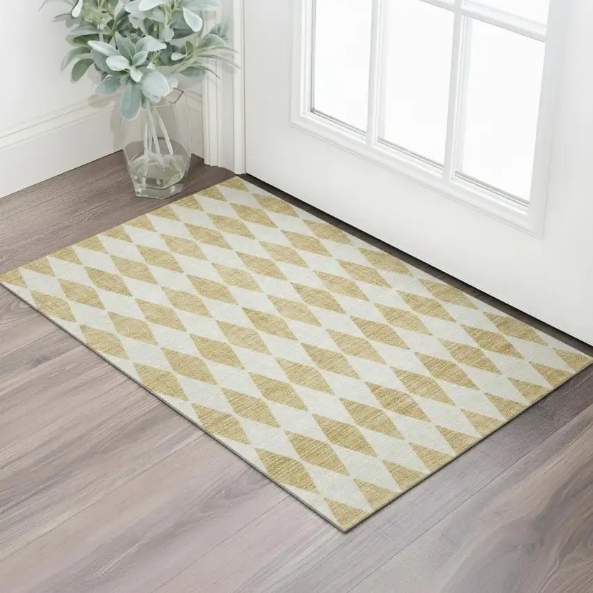 Gold And Ivory Diamond Washable Area Rug With UV Protection Photo 1