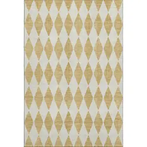 Photo of Gold And Ivory Diamond Washable Area Rug With UV Protection