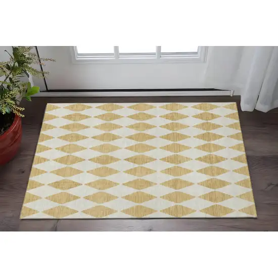 Gold And Ivory Diamond Washable Area Rug With UV Protection Photo 2