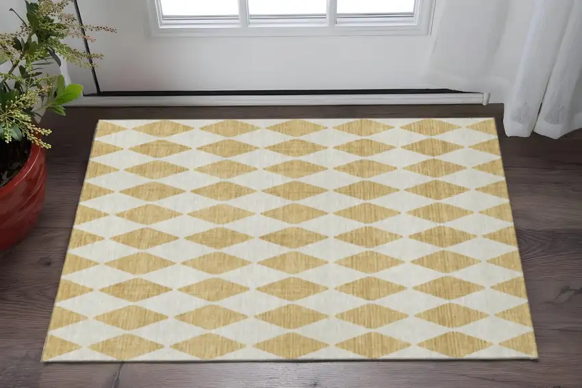 Gold And Ivory Diamond Washable Area Rug With UV Protection Photo 2