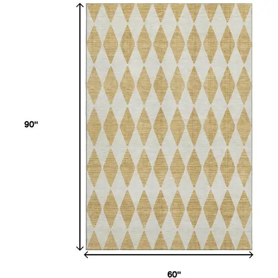 Gold And Ivory Diamond Washable Area Rug With UV Protection Photo 9