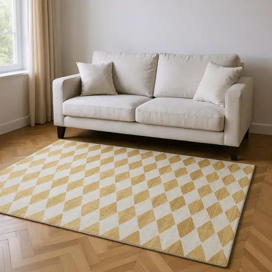 Gold And Ivory Diamond Washable Area Rug With UV Protection Photo 2