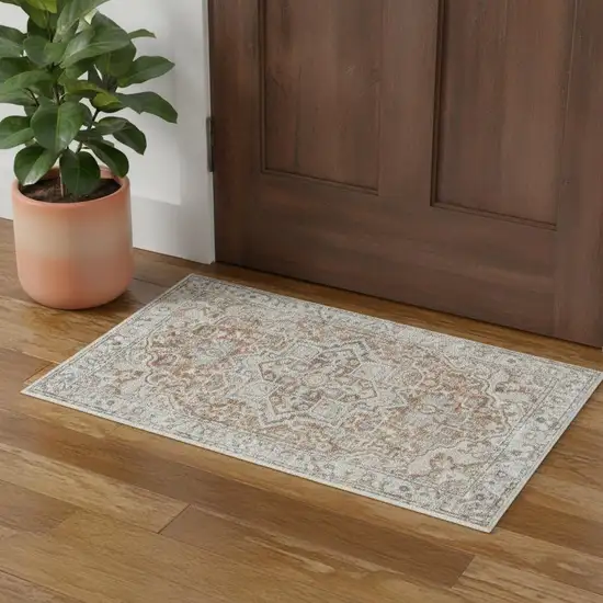 Gold And Ivory Floral Medallion Washable Area Rug Photo 1