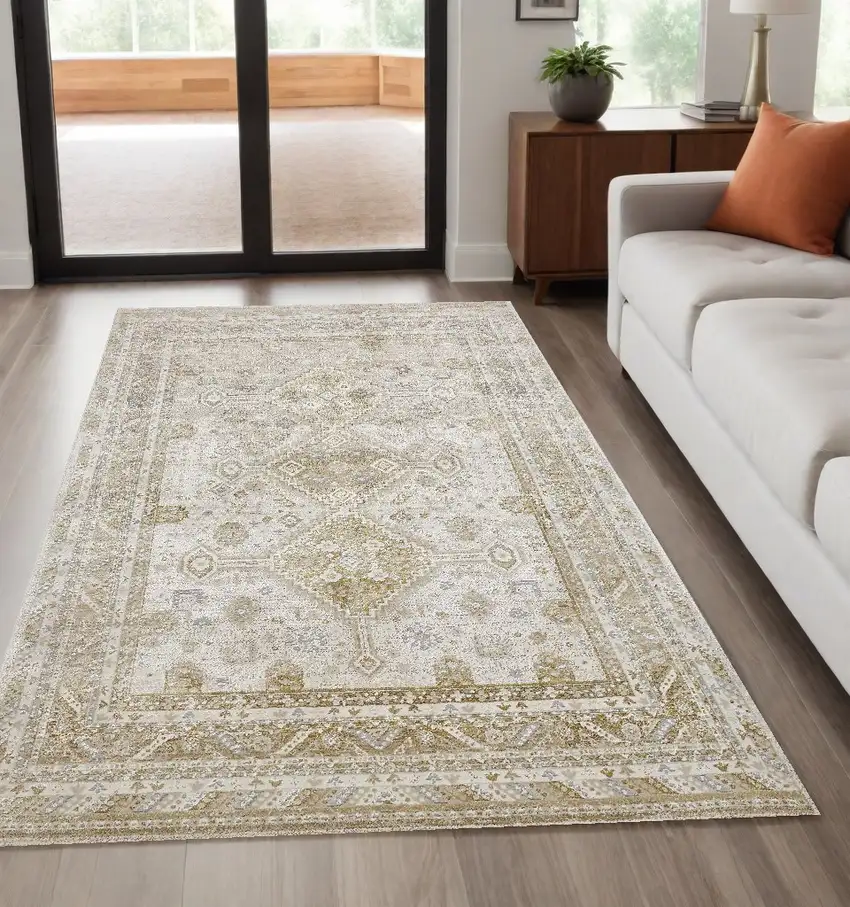 Gold And Ivory Floral Stain Resistant Area Rug Photo 1