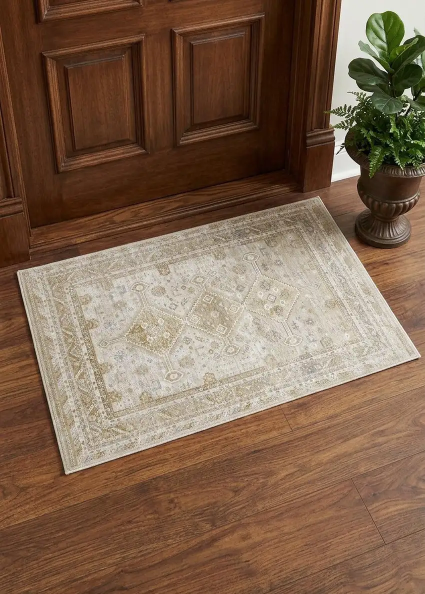 Gold And Ivory Floral Stain Resistant Area Rug Photo 1