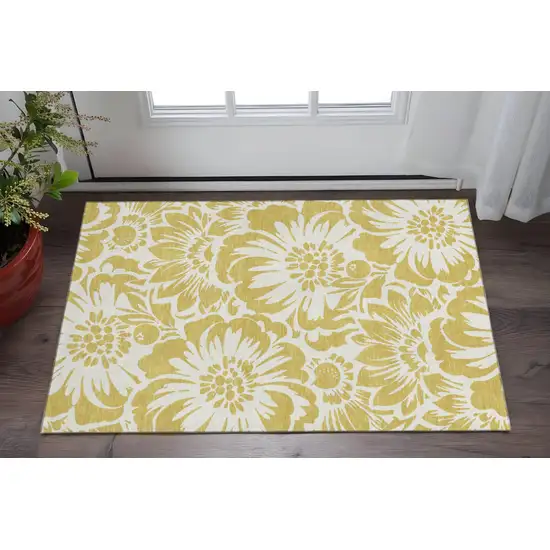 Gold And Ivory Floral Washable Area Rug With UV Protection Photo 2