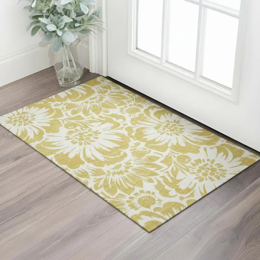 Gold And Ivory Floral Washable Area Rug With UV Protection Photo 1