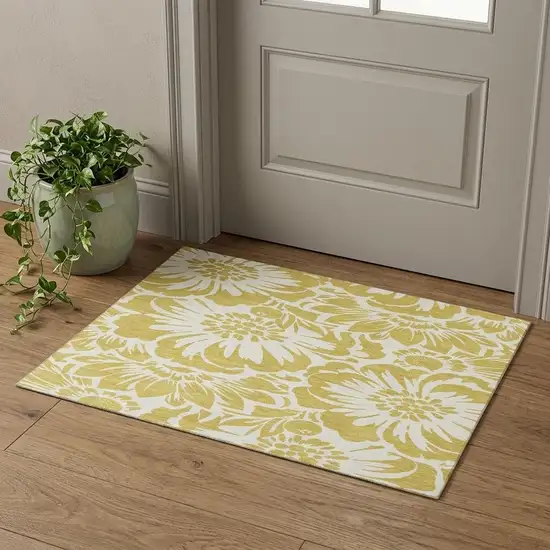Gold And Ivory Floral Washable Area Rug With UV Protection Photo 1