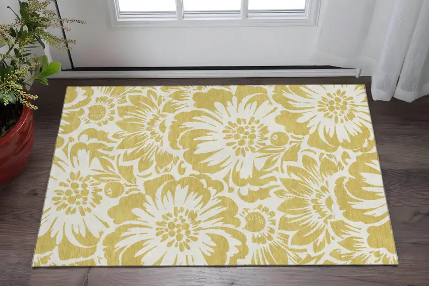 Gold And Ivory Floral Washable Area Rug With UV Protection Photo 2