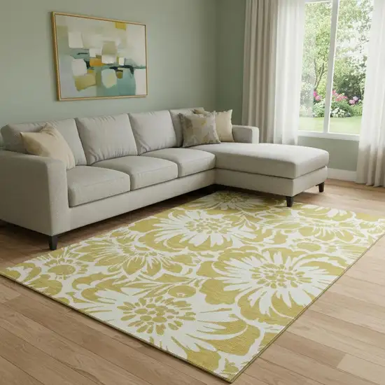 Gold And Ivory Floral Washable Area Rug With UV Protection Photo 1