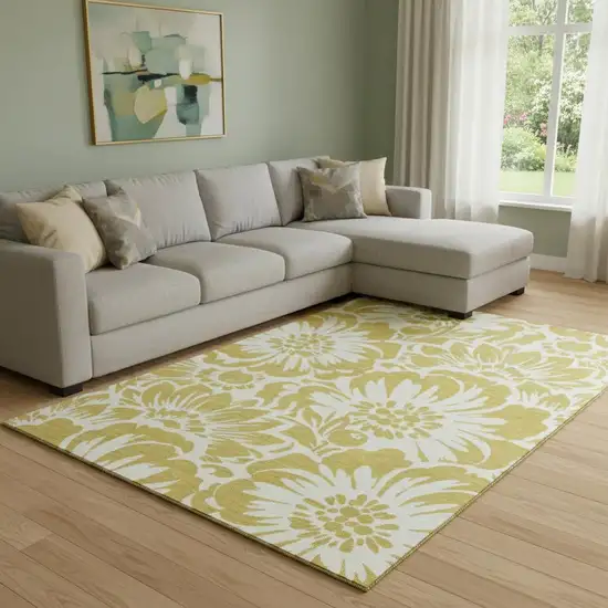 Gold And Ivory Floral Washable Area Rug With UV Protection Photo 1