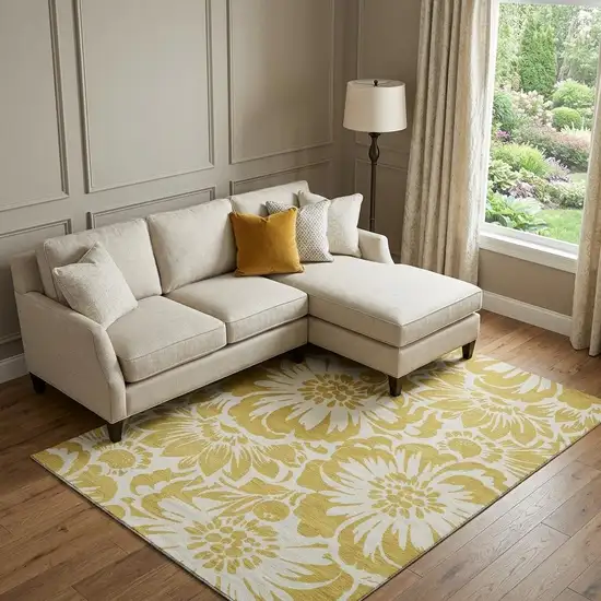 Gold And Ivory Floral Washable Area Rug With UV Protection Photo 1