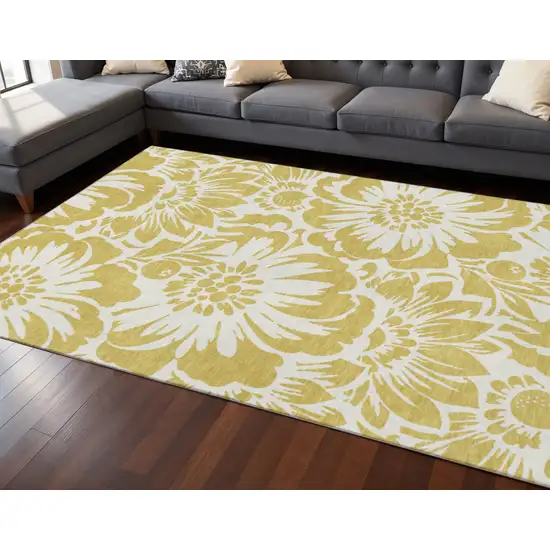 Gold And Ivory Floral Washable Area Rug With UV Protection Photo 2