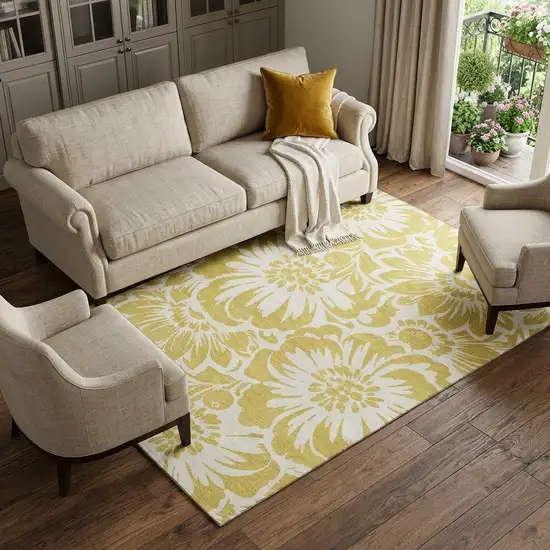 Gold And Ivory Floral Washable Area Rug With UV Protection Photo 1