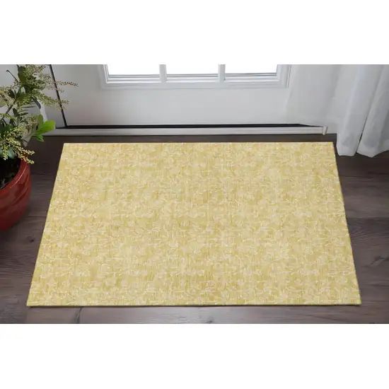 Gold And Ivory Floral Washable Area Rug With UV Protection Photo 2