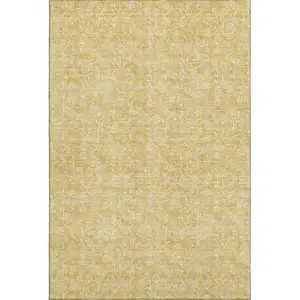 Photo of Gold And Ivory Floral Washable Area Rug With UV Protection