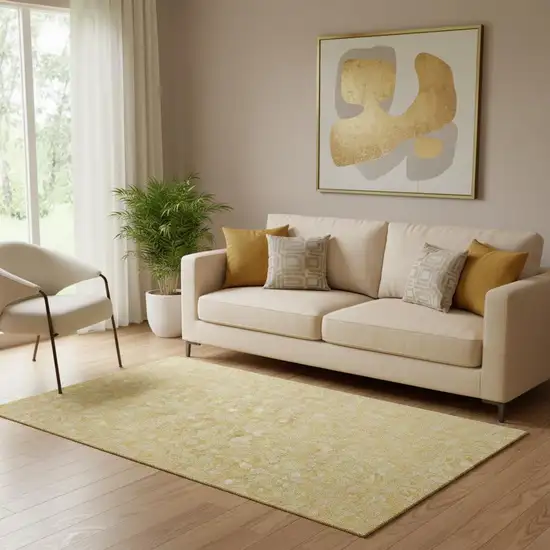 Gold And Ivory Floral Washable Area Rug With UV Protection Photo 1