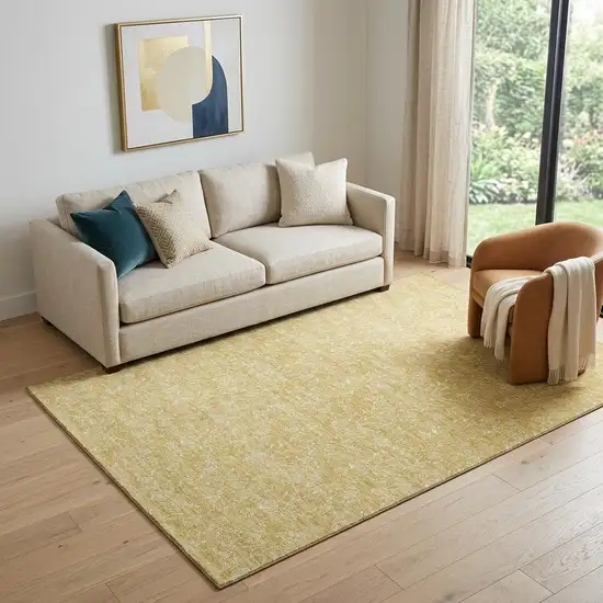 Gold And Ivory Floral Washable Area Rug With UV Protection Photo 1