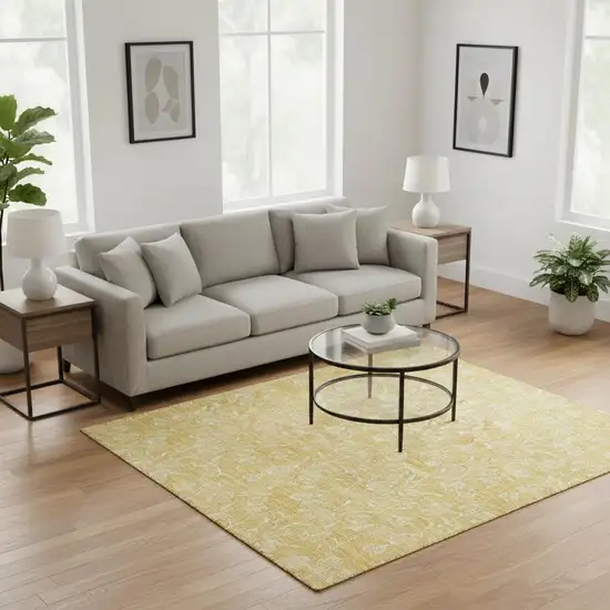 Gold And Ivory Floral Washable Area Rug With UV Protection Photo 1