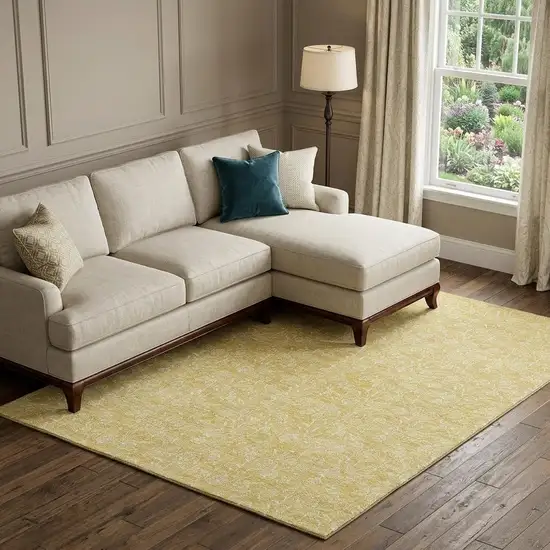 Gold And Ivory Floral Washable Area Rug With UV Protection Photo 1