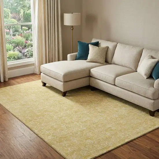 Gold And Ivory Floral Washable Area Rug With UV Protection Photo 1