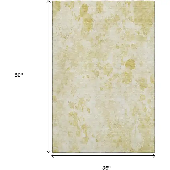 Gold And Ivory Floral Washable Area Rug With UV Protection Photo 3