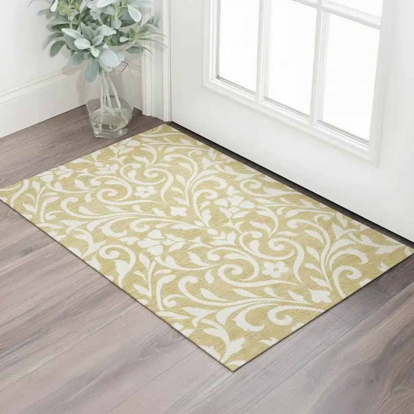 Gold And Ivory Floral Washable Area Rug With UV Protection Photo 2