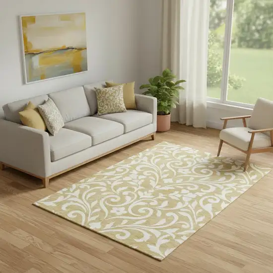 Gold And Ivory Floral Washable Area Rug With UV Protection Photo 1