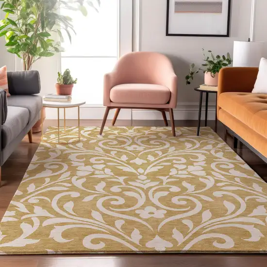 Gold And Ivory Floral Washable Area Rug With UV Protection Photo 4