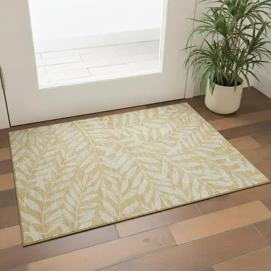 Gold And Ivory Floral Washable Area Rug With UV Protection Photo 2