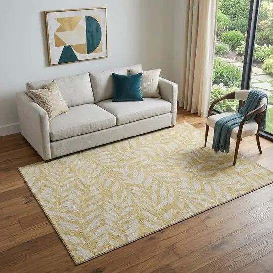 Gold And Ivory Floral Washable Area Rug With UV Protection Photo 1