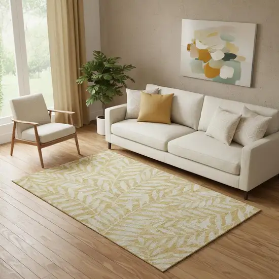 Gold And Ivory Floral Washable Area Rug With UV Protection Photo 1