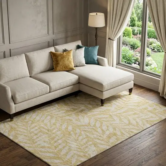 Gold And Ivory Floral Washable Area Rug With UV Protection Photo 1