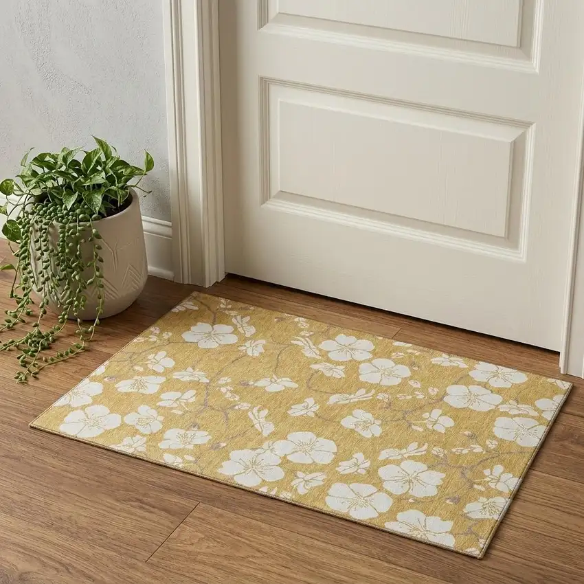 Gold And Ivory Floral Washable Area Rug With UV Protection Photo 1