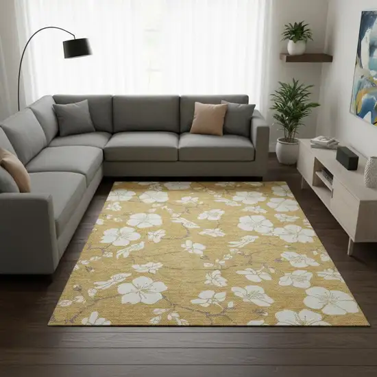 Gold And Ivory Floral Washable Area Rug With UV Protection Photo 2