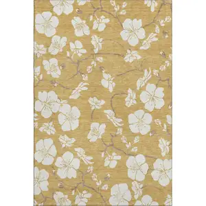 Photo of Gold And Ivory Floral Washable Area Rug With UV Protection