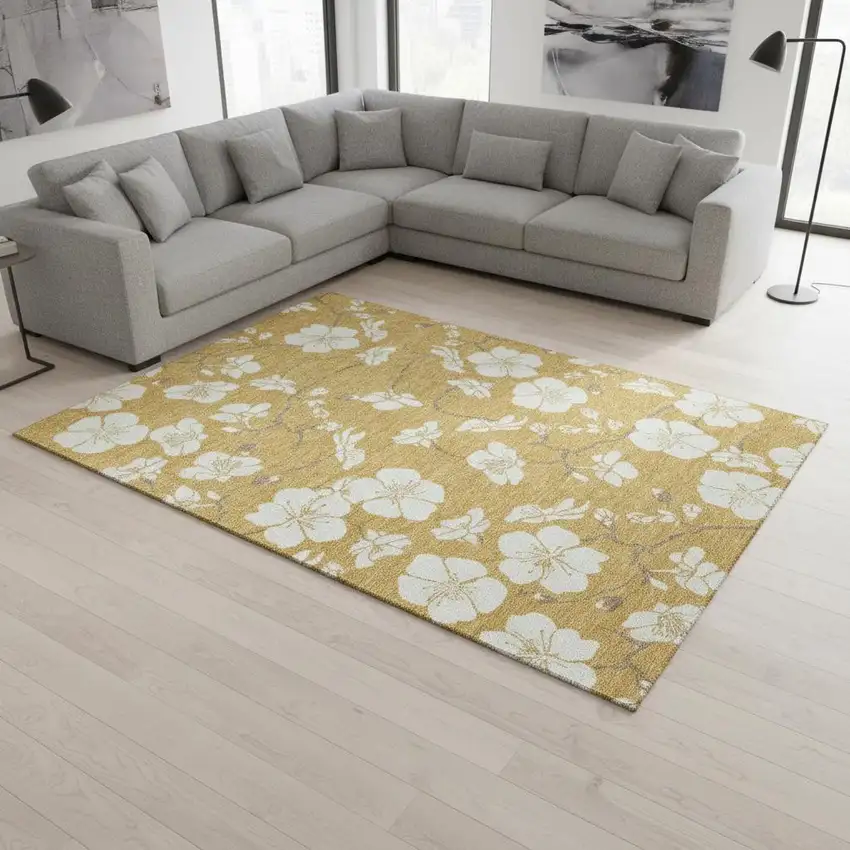Gold And Ivory Floral Washable Area Rug With UV Protection Photo 1