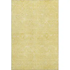 Photo of Gold And Ivory Floral Washable Area Rug With UV Protection