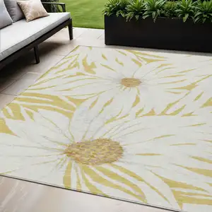 Photo of Gold And Ivory Floral Washable Indoor Outdoor Area Rug
