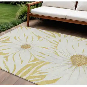 Photo of Gold And Ivory Floral Washable Indoor Outdoor Area Rug