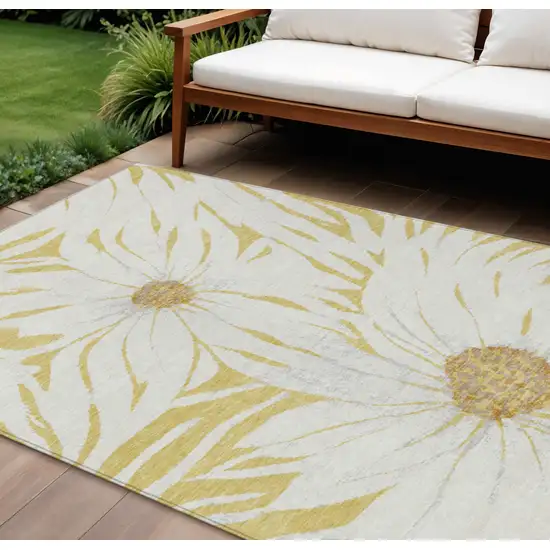 Gold And Ivory Floral Washable Indoor Outdoor Area Rug Photo 1