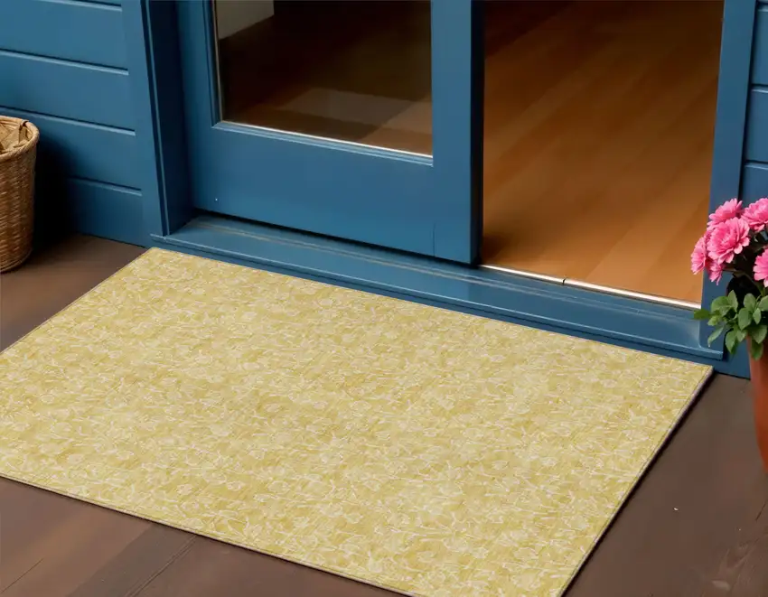 Gold And Ivory Floral Washable Indoor Outdoor Area Rug Photo 1