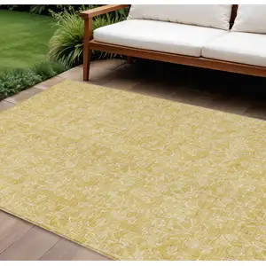 Photo of Gold And Ivory Floral Washable Indoor Outdoor Area Rug
