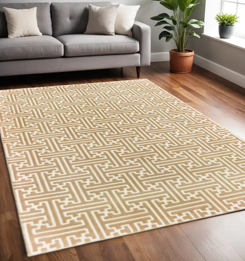 Gold And Ivory Geometric Power Loom Stain Resistant Area Rug Photo 1