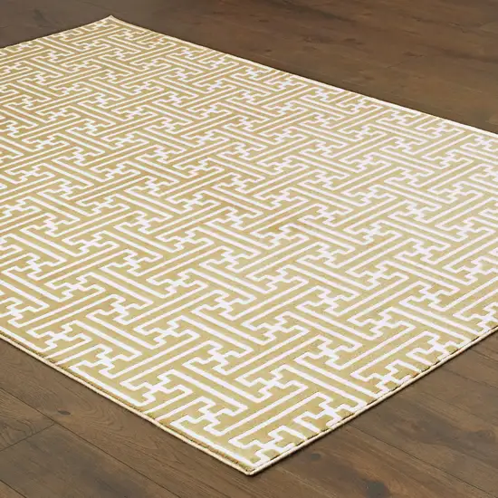 Gold And Ivory Geometric Area Rug Photo 4