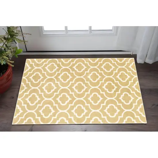 Gold And Ivory Geometric Power Loom Stain Resistant Area Rug Photo 1