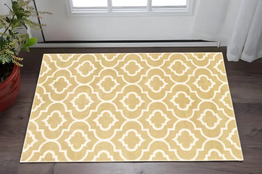 Gold And Ivory Geometric Power Loom Stain Resistant Area Rug Photo 1