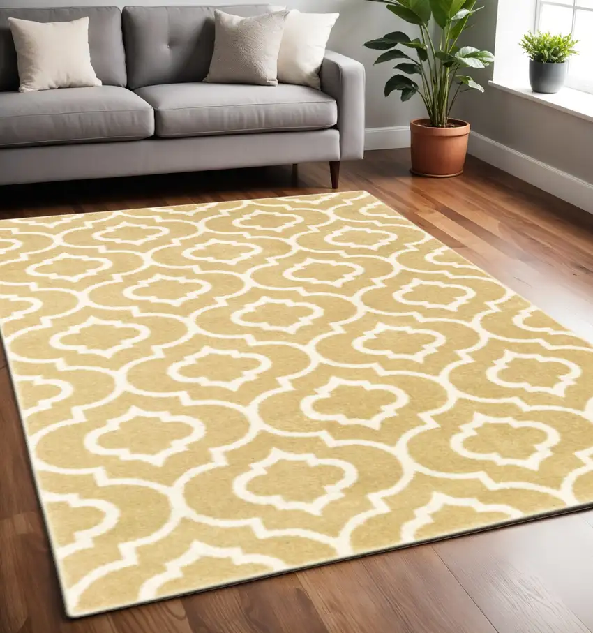 Gold And Ivory Geometric Power Loom Stain Resistant Area Rug Photo 1