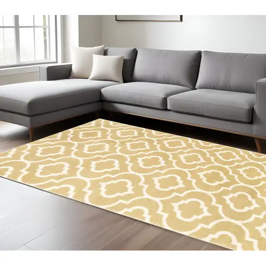 Gold And Ivory Geometric Shag Area Rug Photo 1